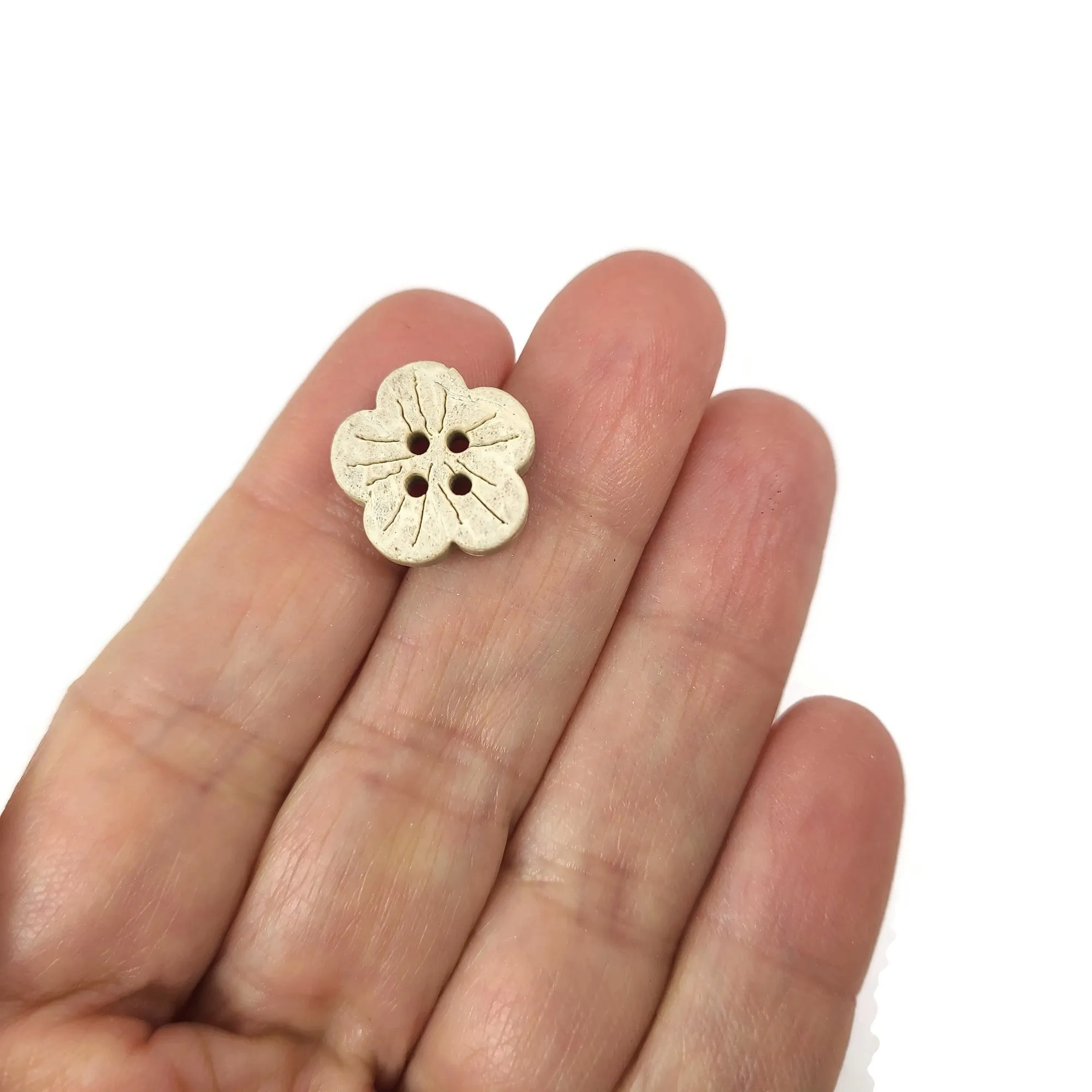6 Flower shape white coconut buttons